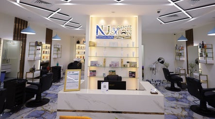 Sophisticated interior of NU Gent's Salon in Dubai, Dubai, AE, showcasing modern design and amenities.
