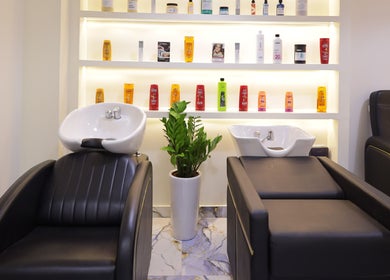 Luxury wash stations at NU Gent's Salon, Dubai, Dubai, AE showcasing sleek design and premium products.