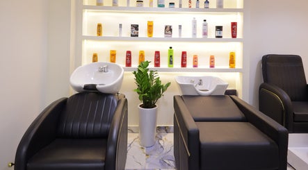 Luxury wash stations at NU Gent's Salon, Dubai, Dubai, AE showcasing sleek design and premium products.
