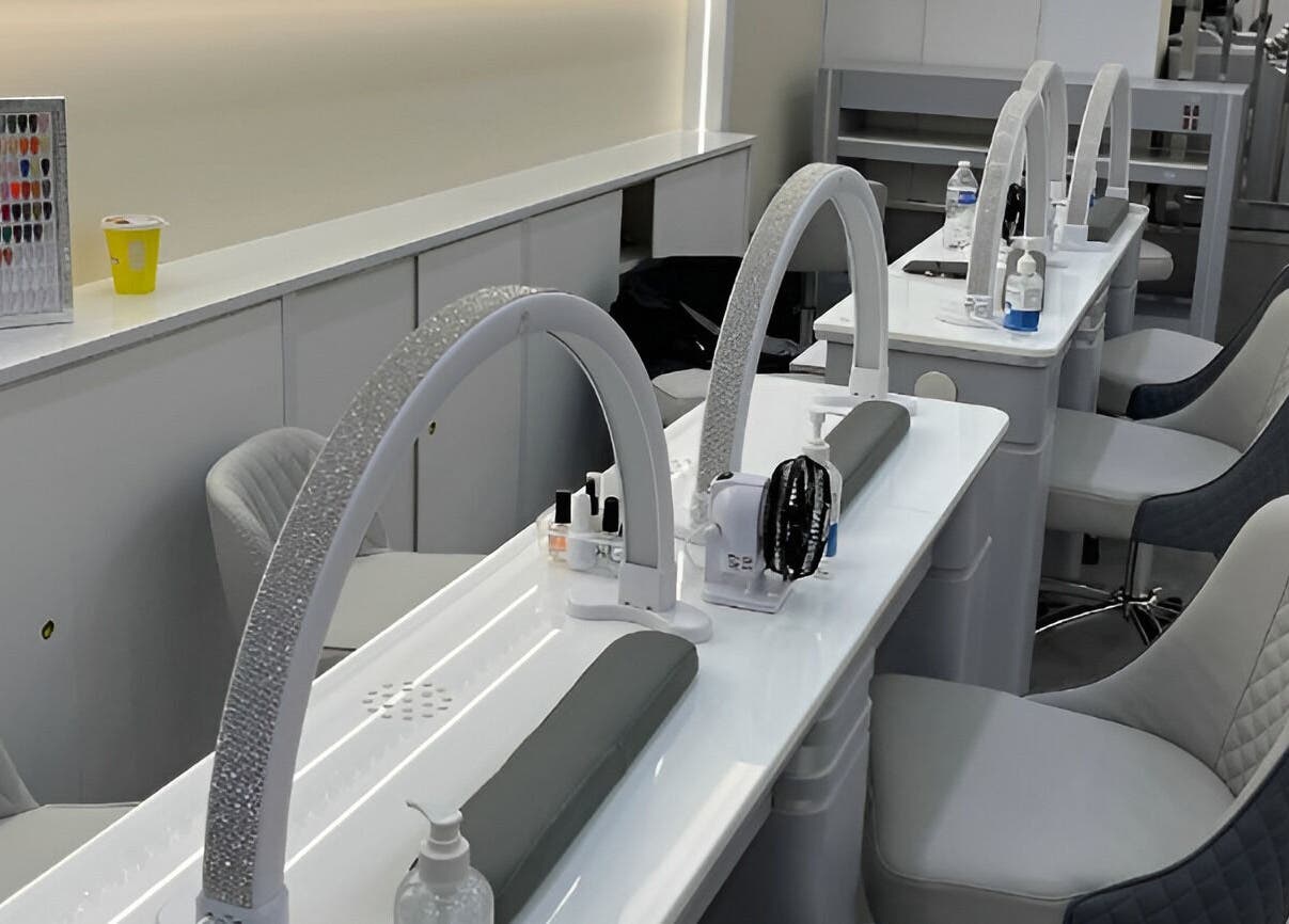 Modern nail station at newpalettenailsstudio, New York, New York, US showcasing sleek design and comfort.