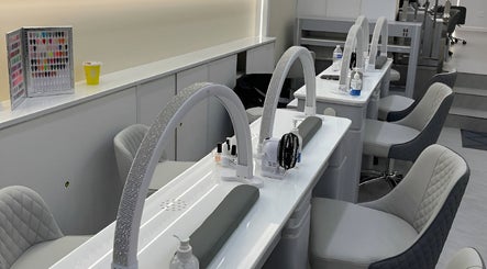 Modern nail station at newpalettenailsstudio, New York, New York, US showcasing sleek design and comfort.