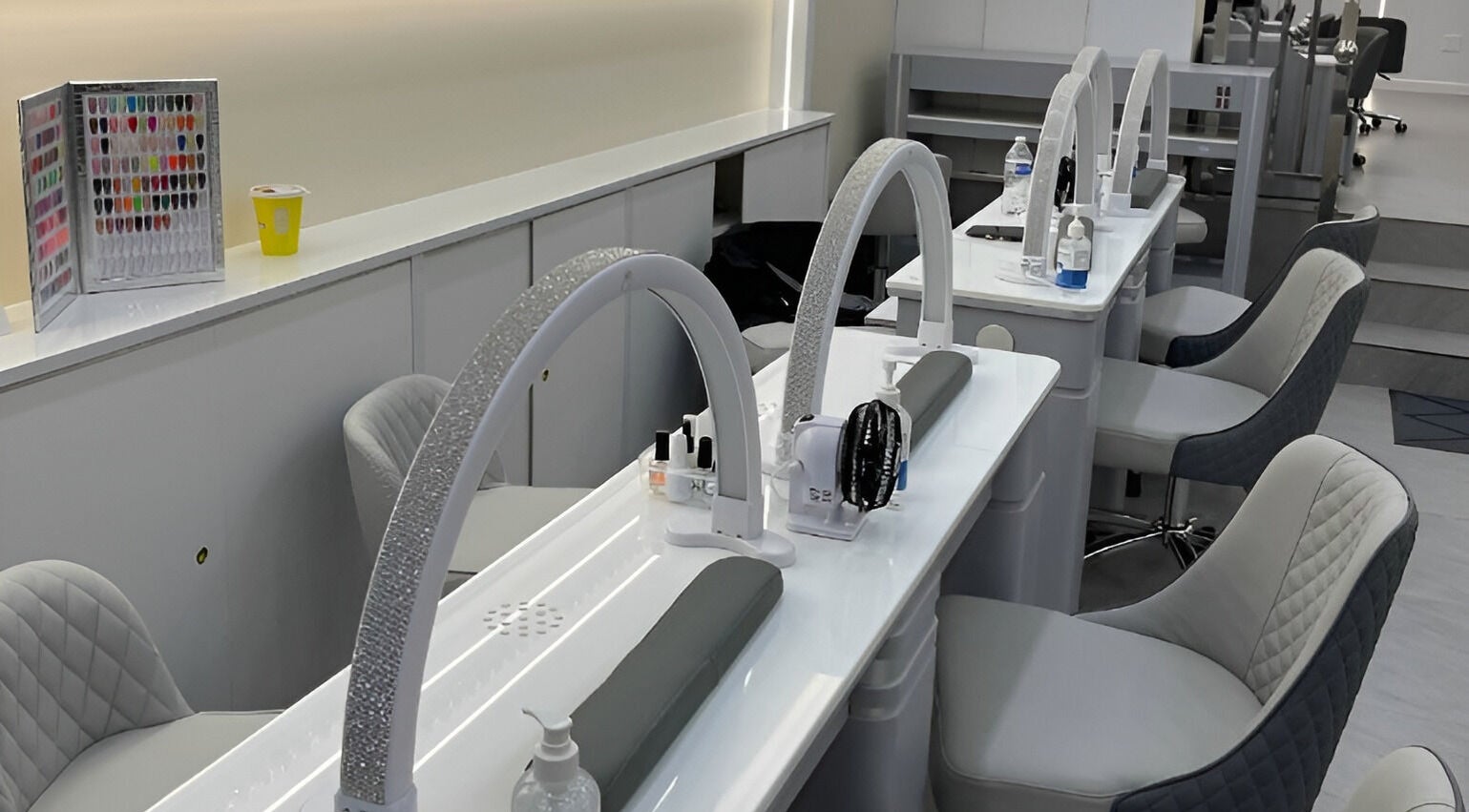Modern nail station at newpalettenailsstudio, New York, New York, US showcasing sleek design and comfort.