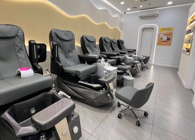 Modern pedicure chairs at newpalettenailsstudio, New York, New York, US, showcasing luxury and comfort.
