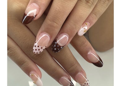 Elegant polka dot and gradient nail art at newpalettenailsstudio, New York, New York, US.