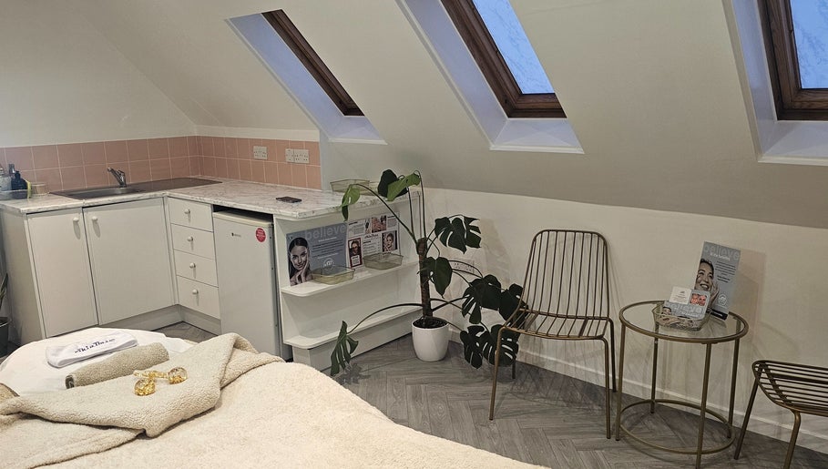 Cozy room with decor and skincare items at AuraLuxe Aesthetics, Saint Leonards, England, GB.