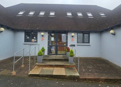 Front entrance of AuraLuxe Aesthetics in Saint Leonards, England, GB, featuring modern design.