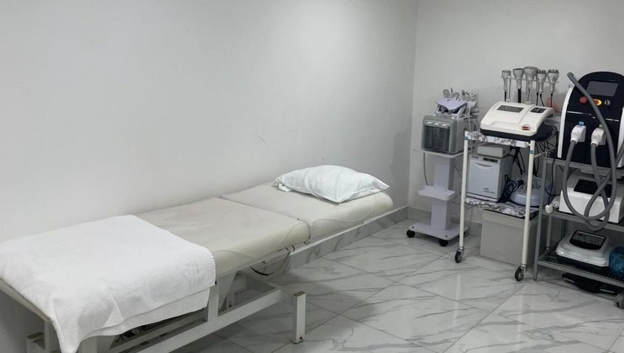 Minimalist treatment room at Medispa Naturhouse, Stevenage, England, GB equipped for beauty and wellness services.