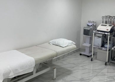 Modern treatment room at Medispa Naturhouse, Stevenage, England, GB, showcasing professional wellness equipment.