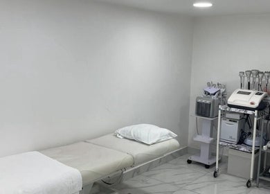 Modern treatment room at Medispa Naturhouse in Stevenage, England, GB featuring advanced wellness equipment.