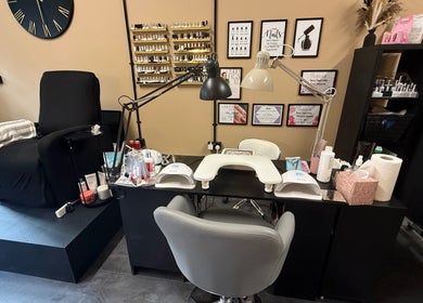 Modern nail salon setup at Nails by Sara, Port Glasgow, Scotland, GB with stylish decor and equipment.