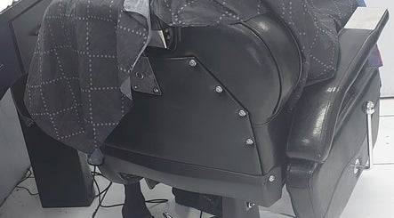 Stylish barber chair at Transformation Beauty - Barber in George Town, George Town, KY.