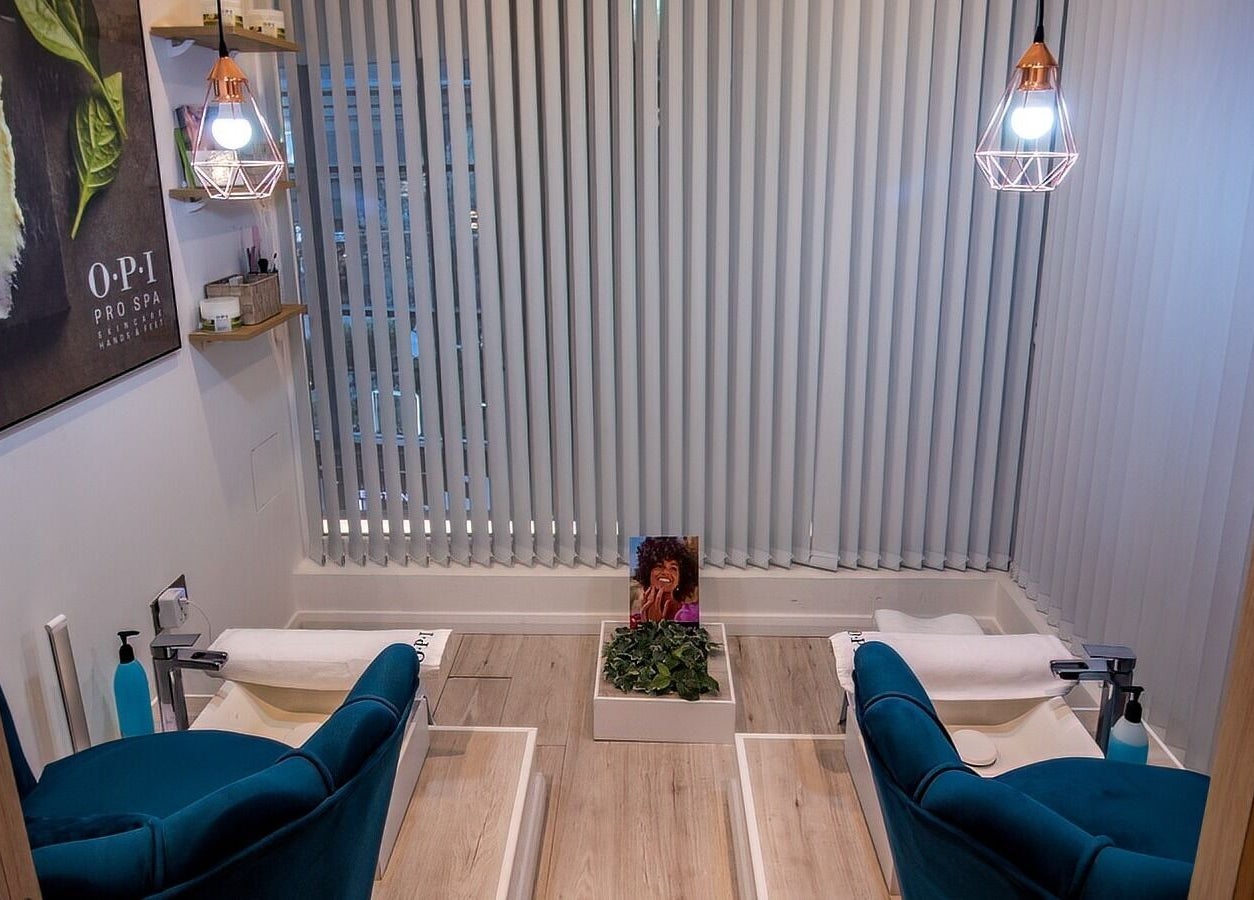 Cozy pedicure chairs at Studio 44 Clinic in Gibraltar, GI, featuring elegant decor and soothing ambiance.