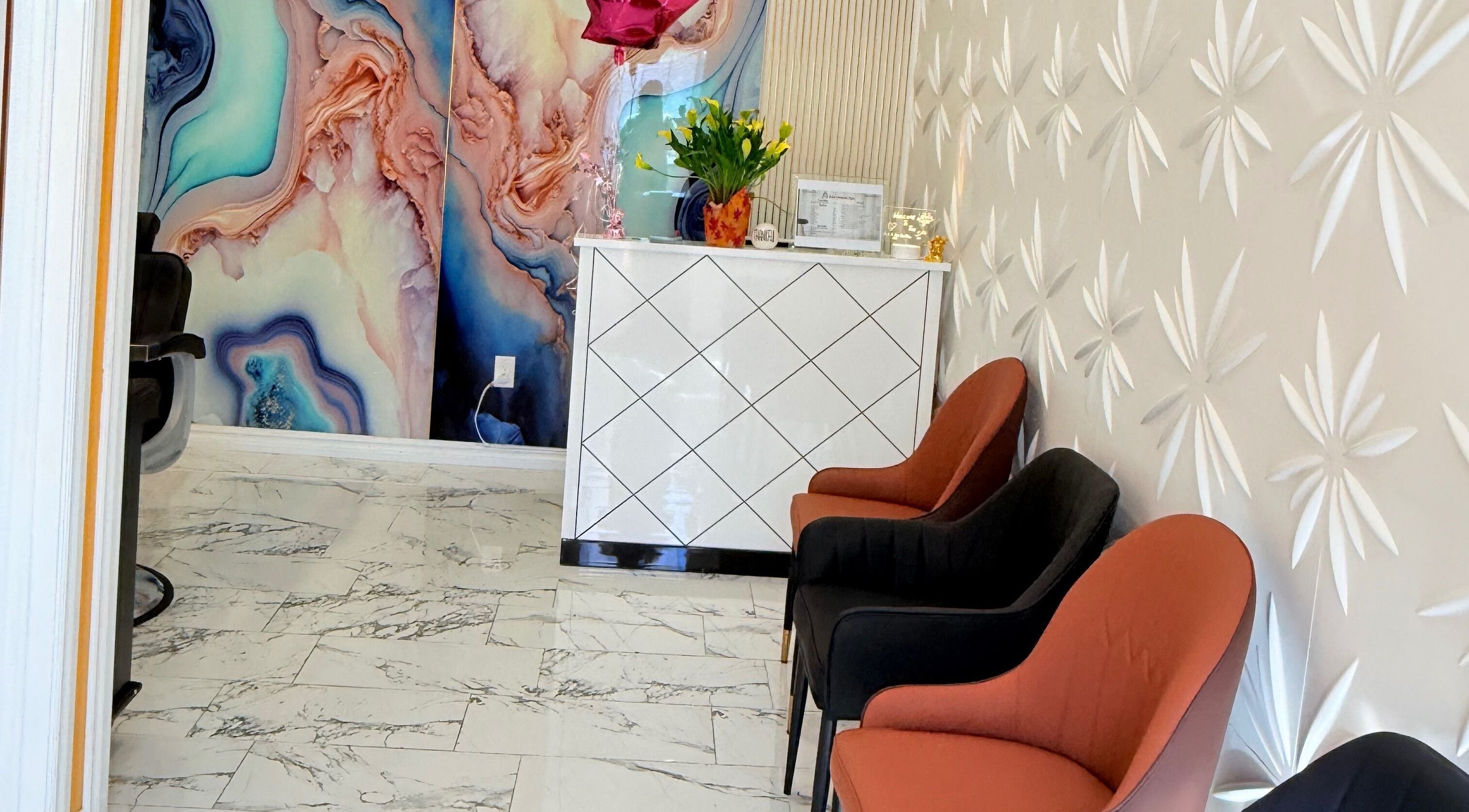 Lobby of Soul Heaven Spa in Shelburne, Ontario, CA features elegant chairs and a colorful mural.