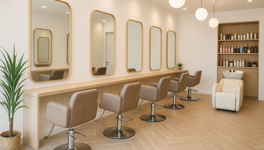 Elegant salon interior at The Beauty Spot, Tunapuna, featuring chic chairs and mirrors for a luxurious experience.