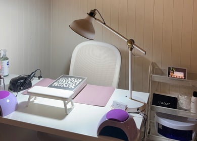 Elegant nail station at FORREST Beauty & Wellness, County Wexford, IE, showcasing tools and decor.