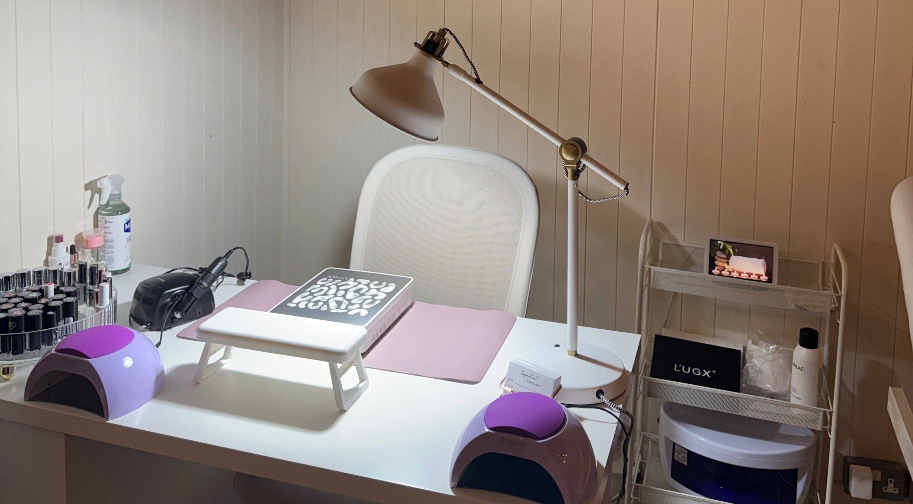 Elegant nail station at FORREST Beauty & Wellness, County Wexford, IE, showcasing tools and decor.