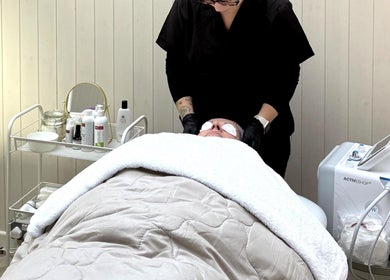Facial treatment at FORREST Beauty & Wellness, County Wexford, IE. A client enjoys a relaxing spa experience.