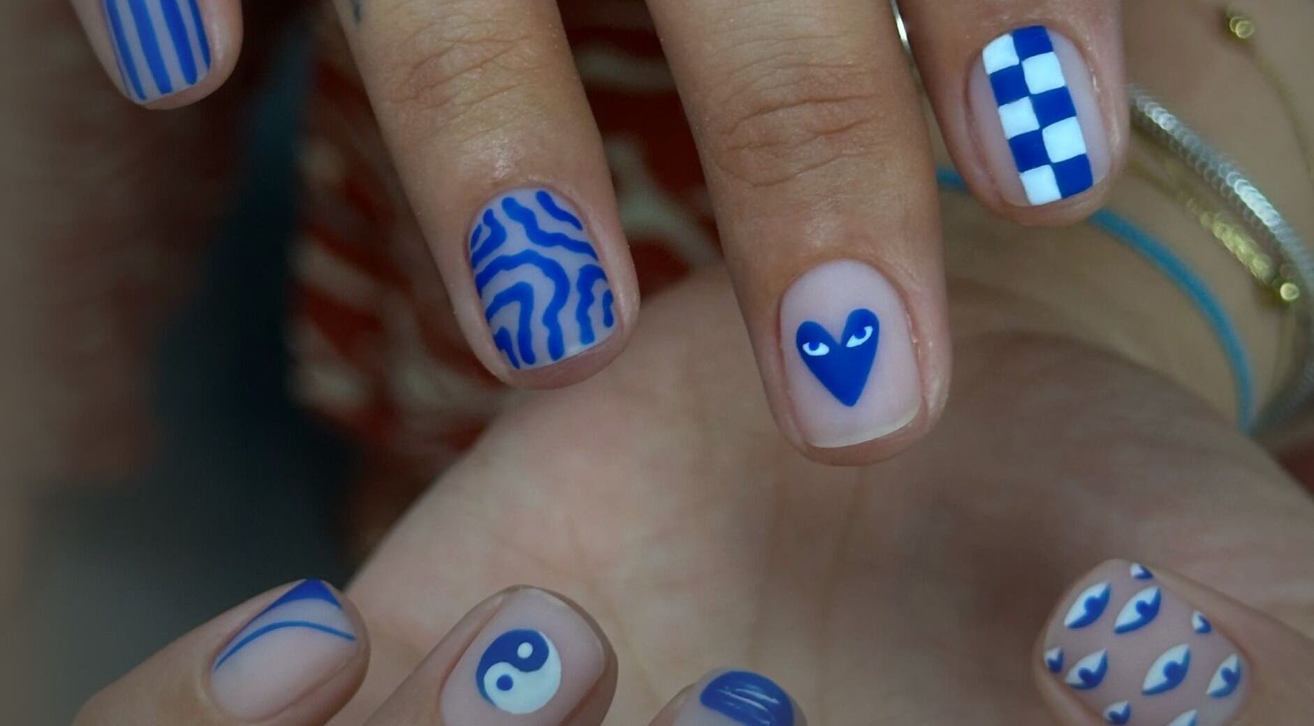 Blue artistic nail designs at Russalon Beauty Studio in Marrakech-safi, Marrakech-safi, MA.