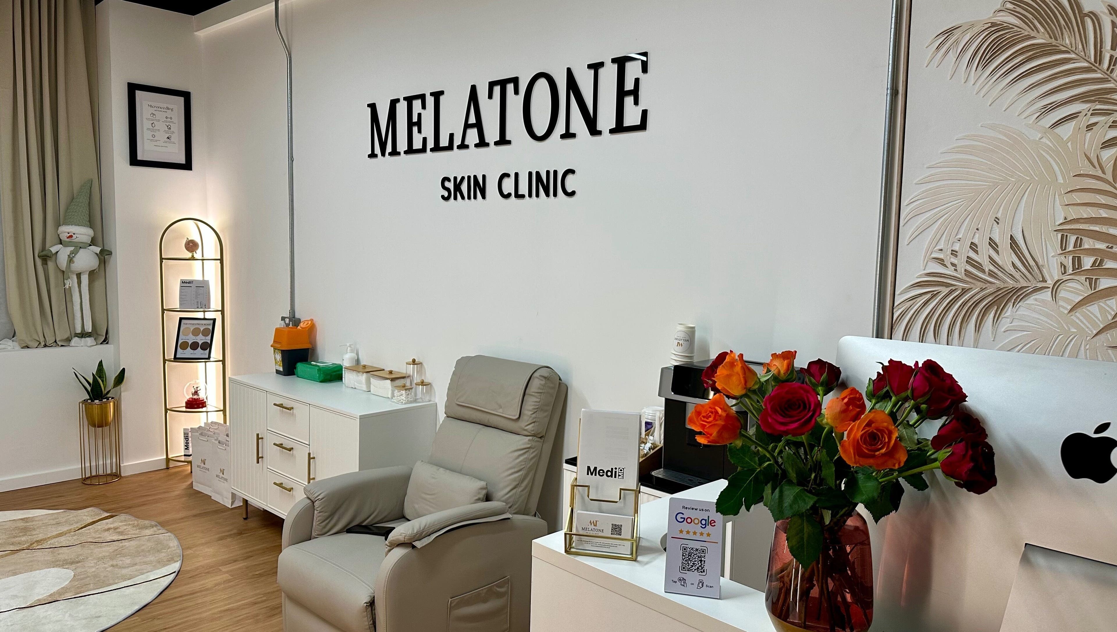 Relaxing interior of Melatone Skin Clinic in London, England, GB with comfortable seating and elegant decor.