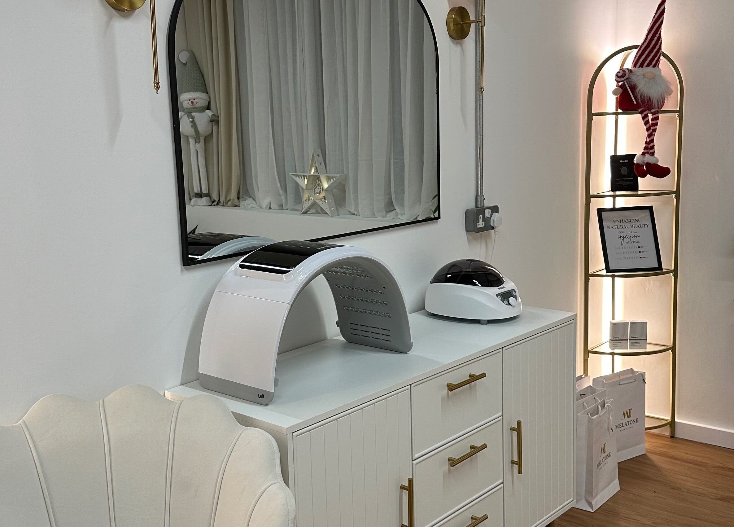 Chic interior at Melatone Skin Clinic, London, England, GB featuring stylish decor and advanced beauty equipment.
