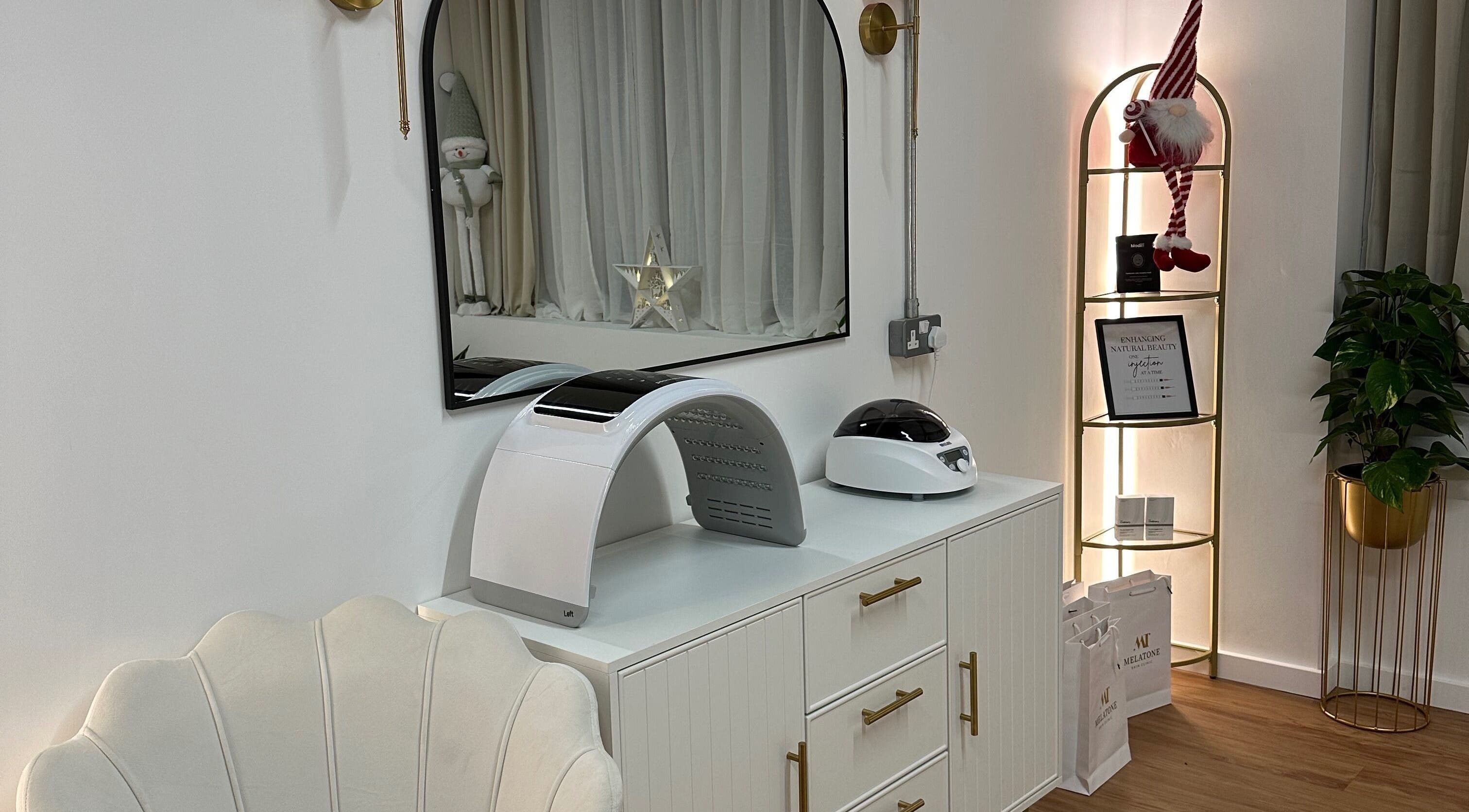 Chic interior at Melatone Skin Clinic, London, England, GB featuring stylish decor and advanced beauty equipment.