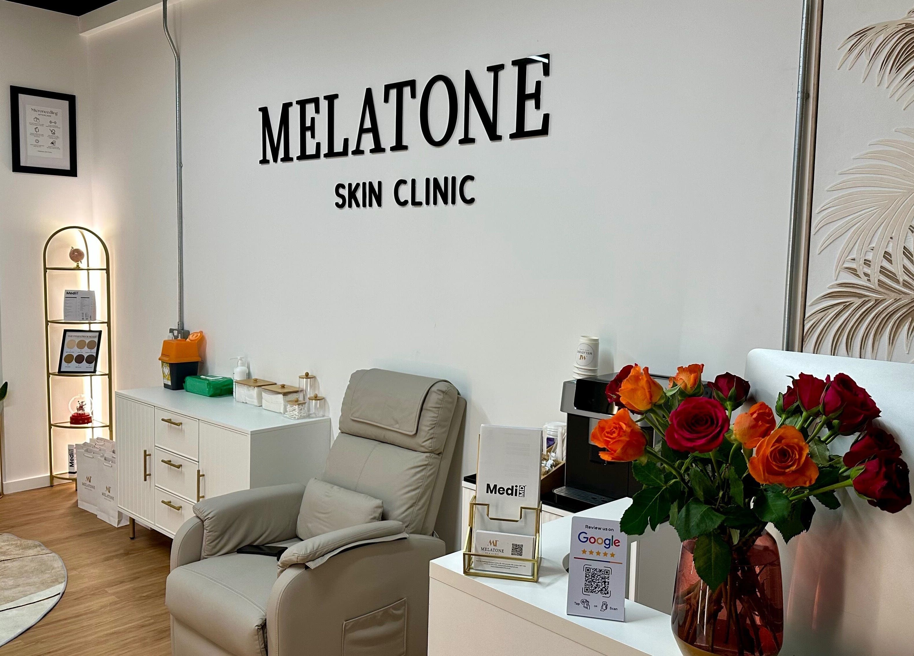 Elegant interior of Melatone Skin Clinic in London, England, GB, featuring stylish decor and cozy seating.