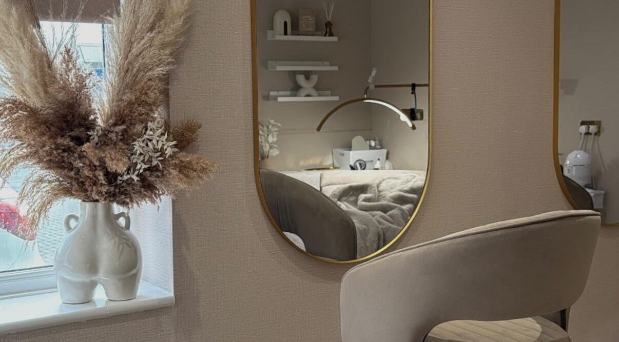 Chic salon interior at Hair extensions by Halle, Killingworth, England, GB with stylish decor and warm lighting.