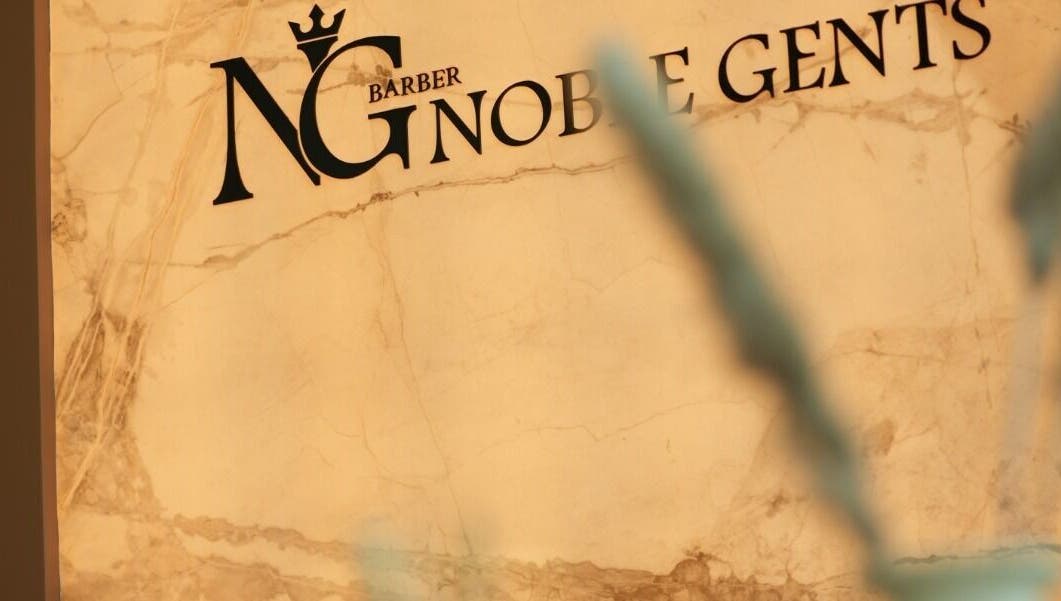 Elegant Noble Gents sign on marble wall, Riyadh, Riyadh Province, SA, showcasing luxury venue.