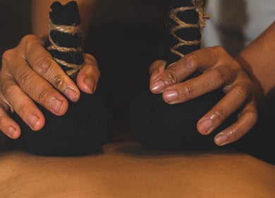 Traditional herbal massage at Darbha Spa Ubud, Bali, Bali, ID. Discover rejuvenation and wellness.