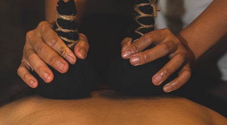 Traditional herbal massage at Darbha Spa Ubud, Bali, Bali, ID. Discover rejuvenation and wellness.