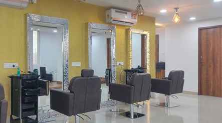 Chic interior of Jawed Habib Unisex Salon - Hopefarm Whitefield, Bengaluru, Karnataka, IN with stylish chairs and mirrors.