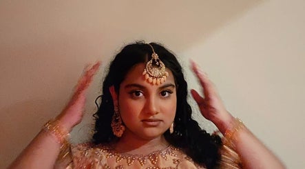 Intricate jewelry adorns a woman's hair, showcasing beauty at Pint-Sized Beauty, Kensington Park, South Australia, AU.