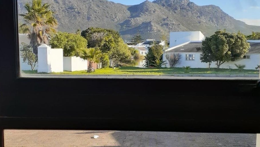 View from Hair and Beauty by Latoya, Cape Town, Western Cape, ZA, showcasing lush greenery with mountain backdrop.