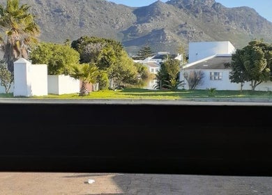 View from Hair and Beauty by Latoya, Cape Town, Western Cape, ZA, showcasing lush greenery with mountain backdrop.