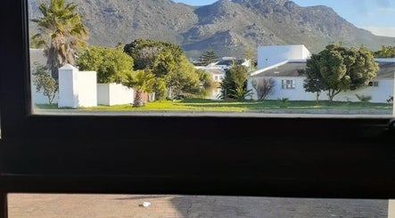 View from Hair and Beauty by Latoya, Cape Town, Western Cape, ZA, showcasing lush greenery with mountain backdrop.