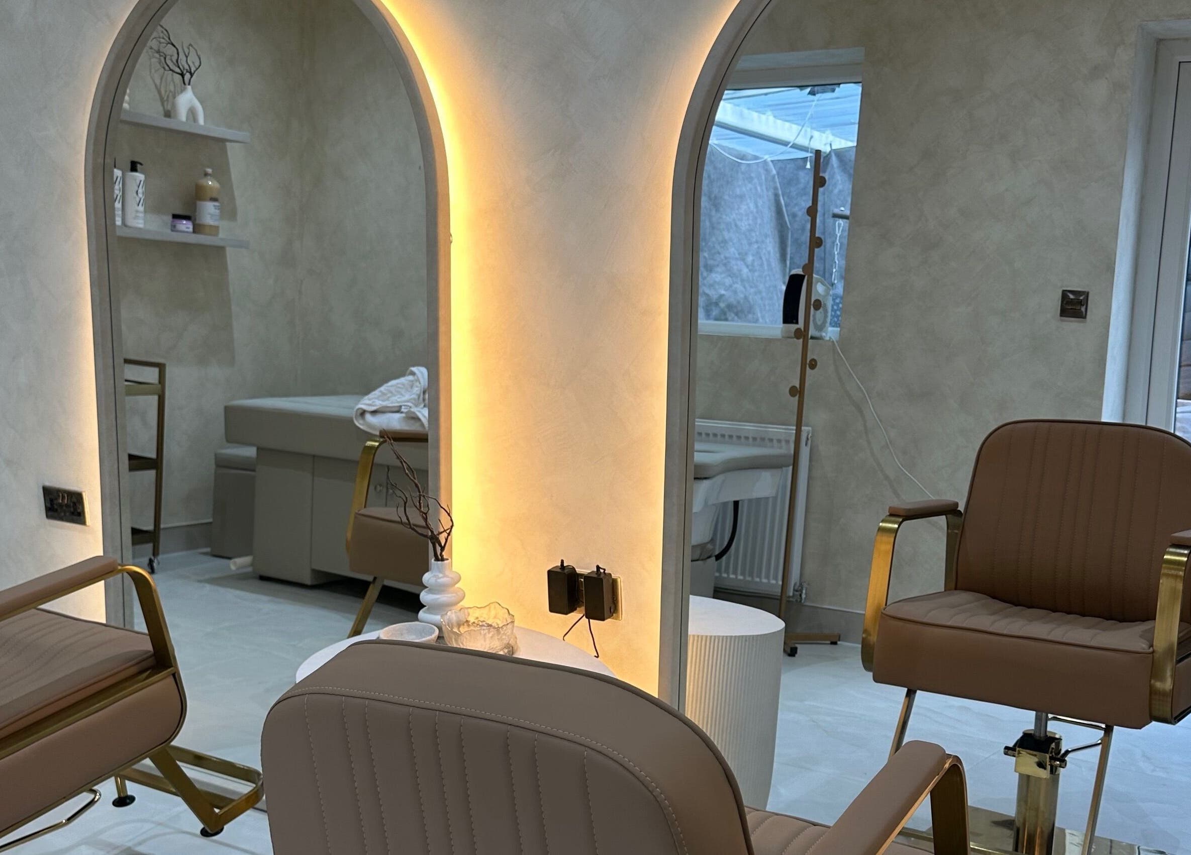 Luxurious salon interior at HBA HAIR, Leicester, England, GB with chic seating and modern decor.