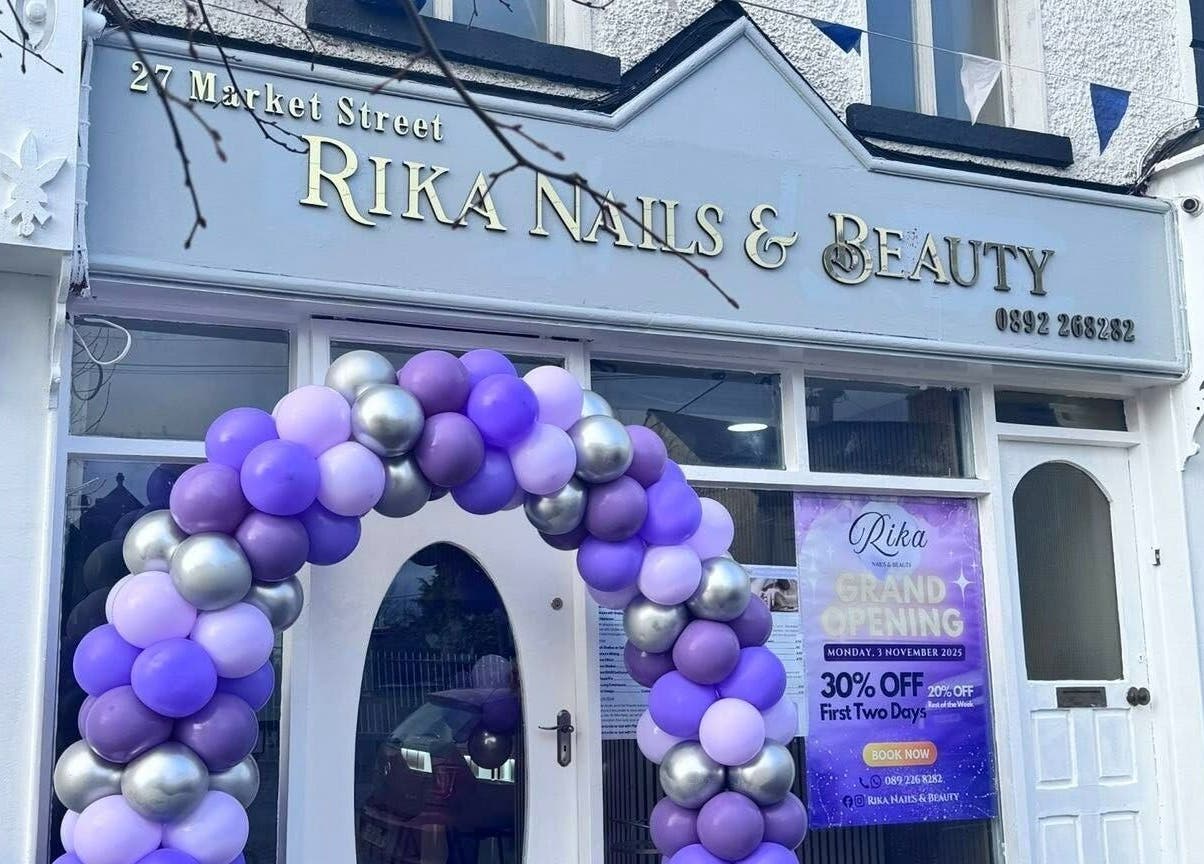 Rika Nails & Beauty in County Louth, IE, with festive balloons framing entry.
