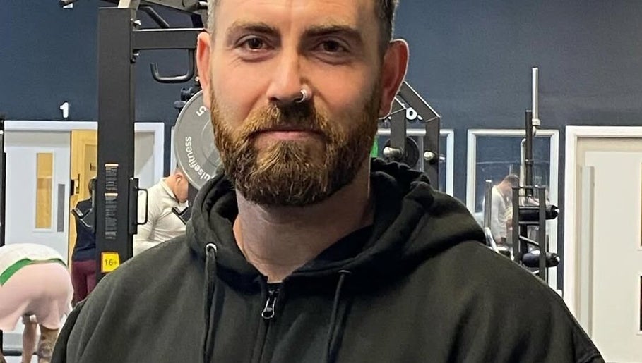 Trainer at JC Sports Massage and Soft Tissue Therapy in a gym setting, Chesterfield, England, GB.