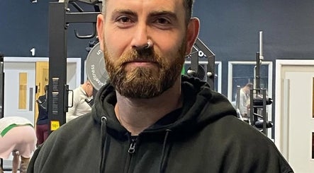 Trainer at JC Sports Massage and Soft Tissue Therapy in a gym setting, Chesterfield, England, GB.