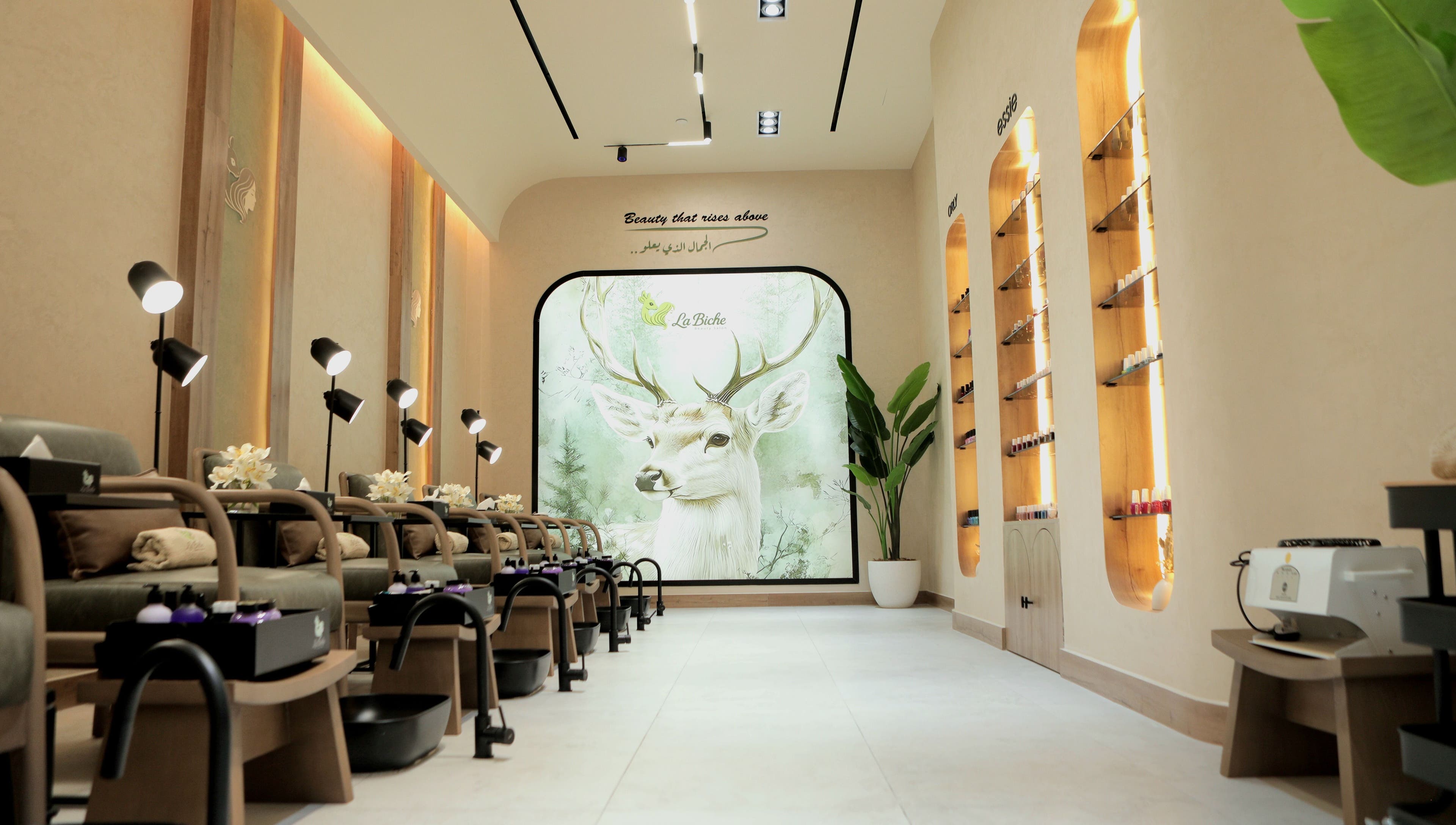Elegant interior of La Biche Beauty Salon in Abu Dhabi, featuring serene decor and luxurious seating.