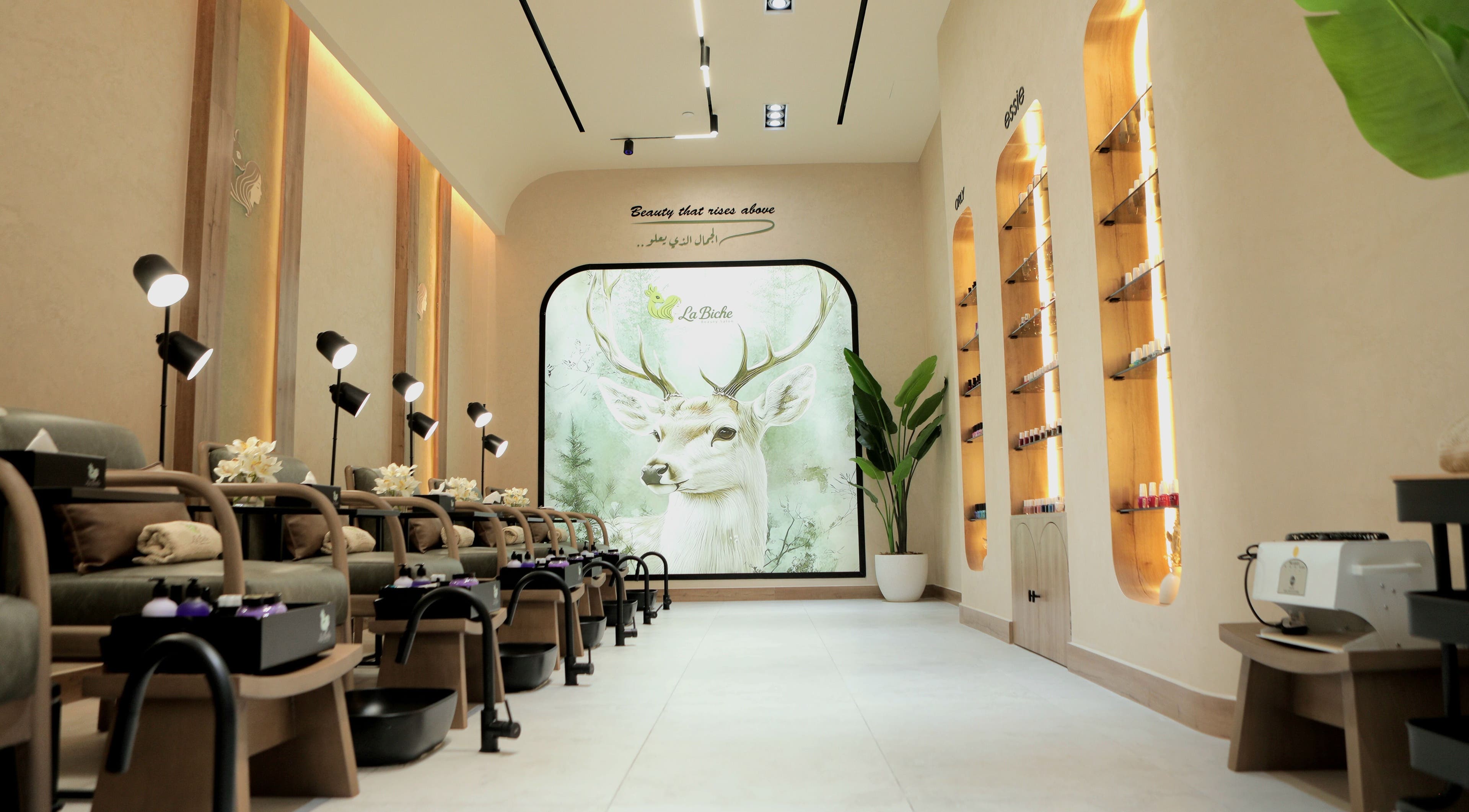 Elegant interior of La Biche Beauty Salon in Abu Dhabi, featuring serene decor and luxurious seating.