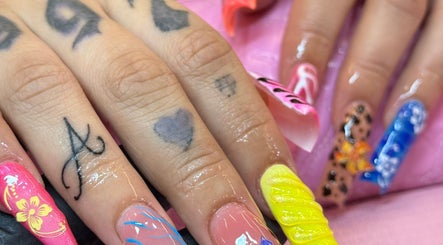 Vibrant nail art designs at Ambitious Beauty Bar, Virginia, Virginia, US showcasing creativity.