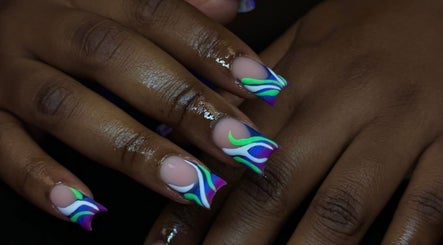 Colorful nail design at Ambitious Beauty Bar, Virginia, Virginia, US showcasing artistic flair.