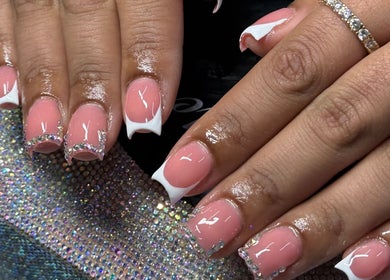 Elegant pink and white embellished nails at Ambitious Beauty Bar, Virginia, Virginia, US.