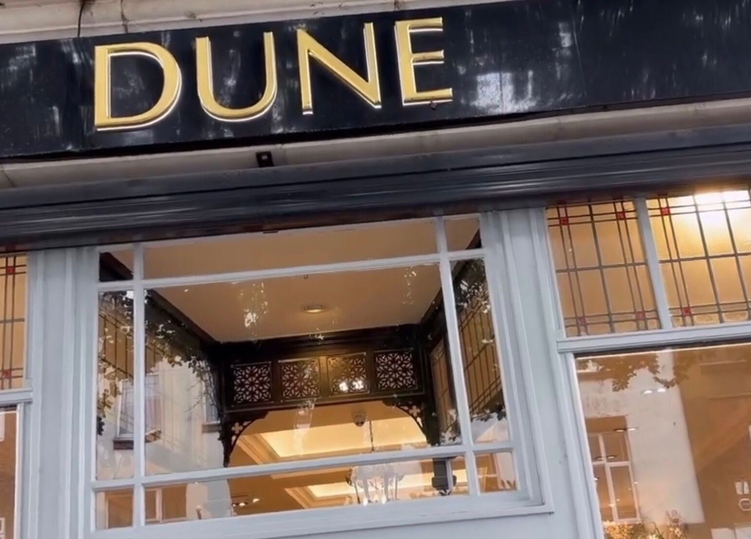 Nalis Studio's charming frontage with decorative glass, Poole, England, GB.