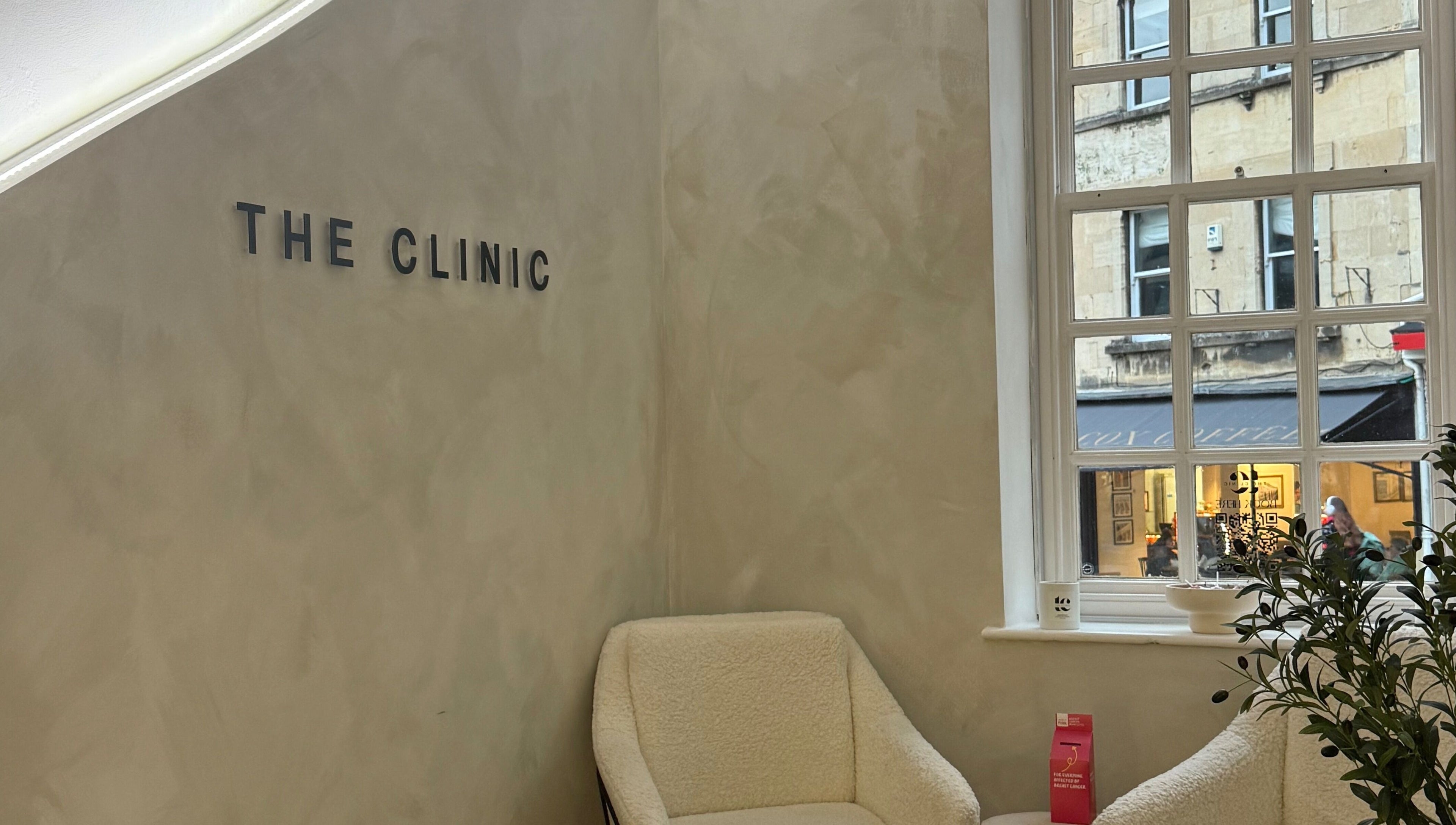 Inviting seating area at New Vision Aesthetics, Bath, England, GB showcasing plush chairs and serene decor.