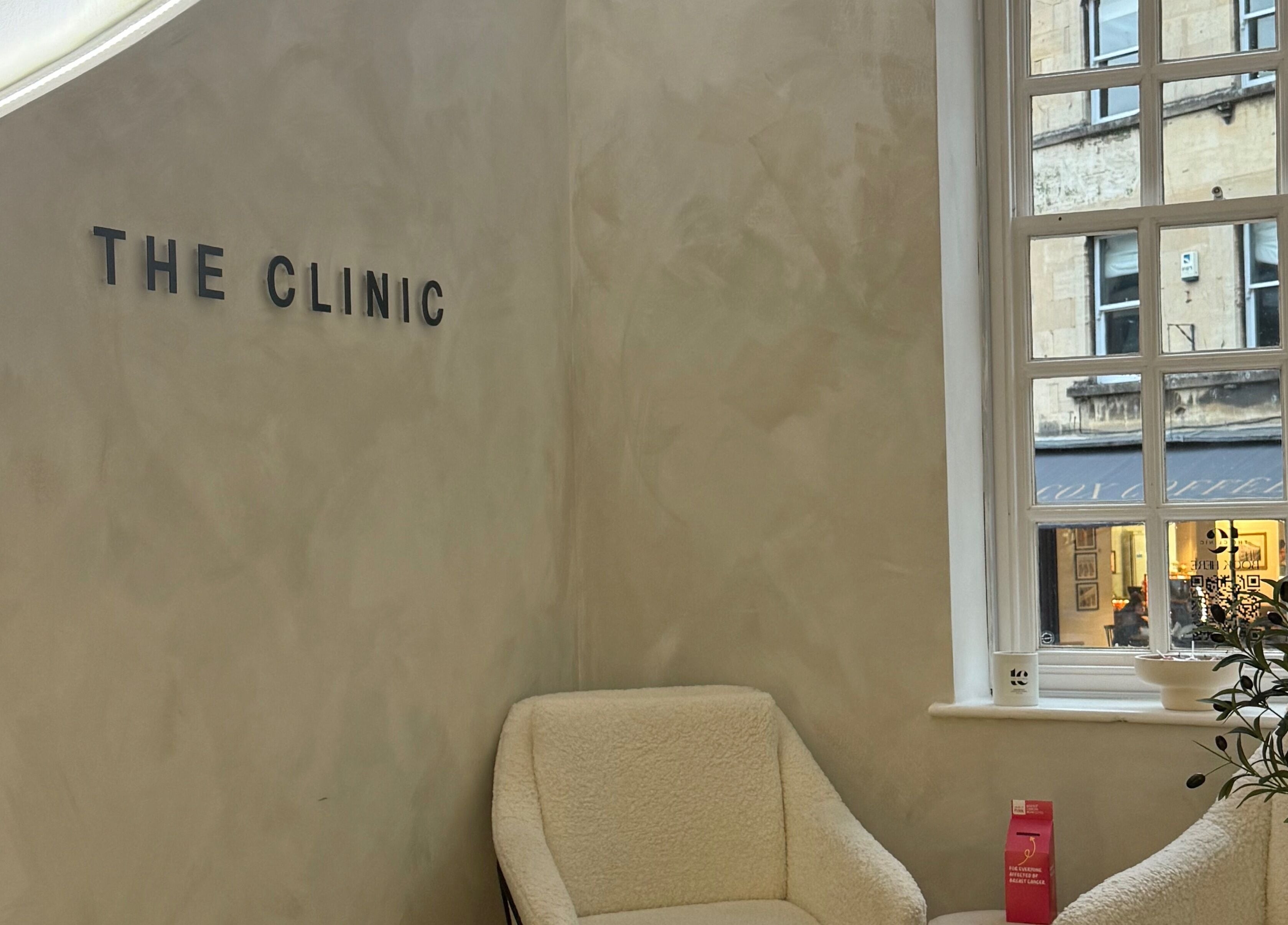 Inviting seating area at New Vision Aesthetics, Bath, England, GB showcasing plush chairs and serene decor.