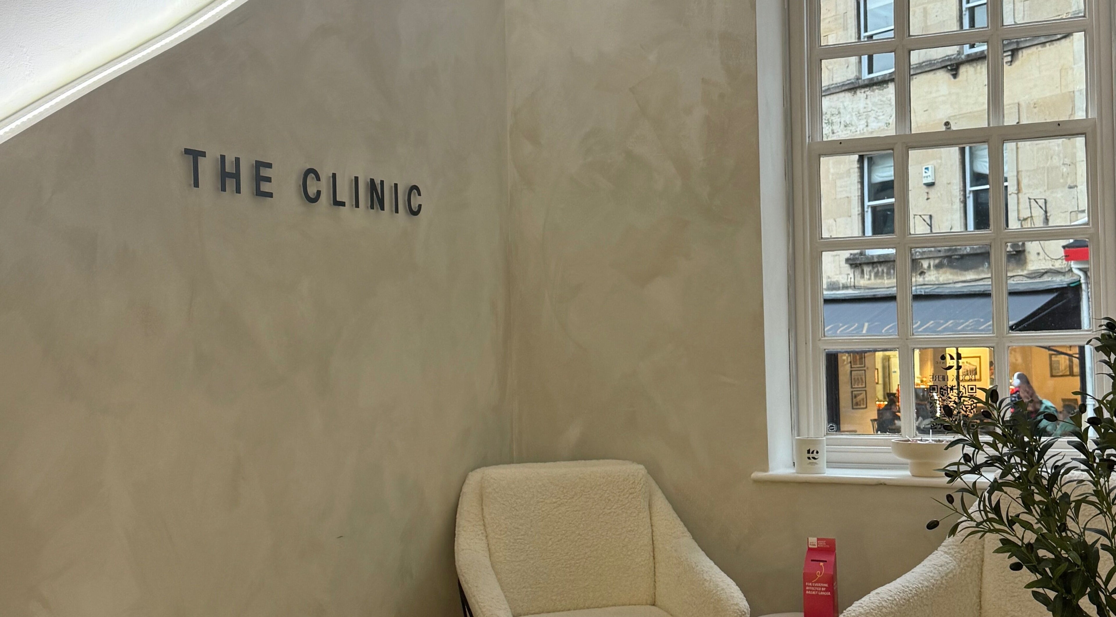 Inviting seating area at New Vision Aesthetics, Bath, England, GB showcasing plush chairs and serene decor.