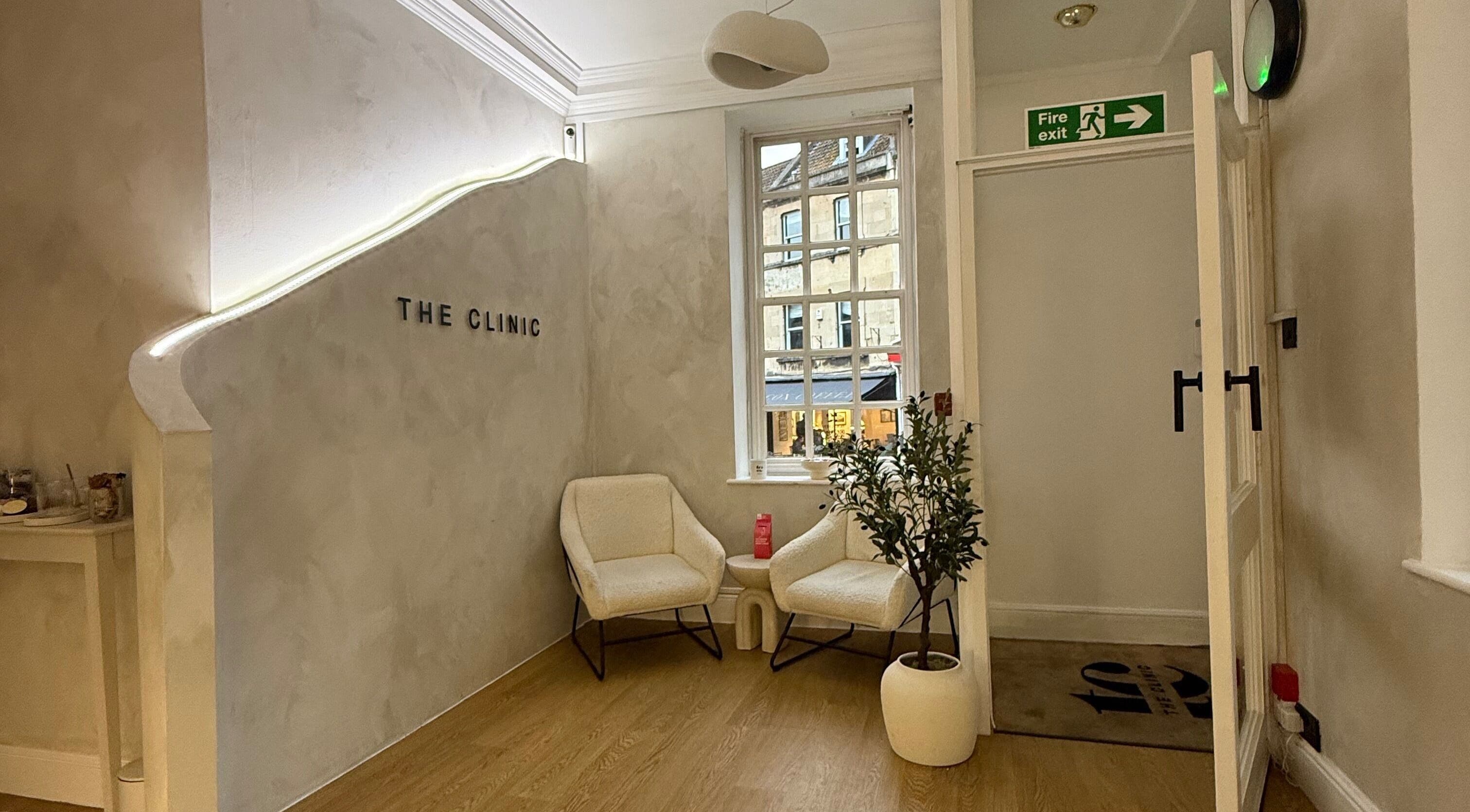 Inviting seating area at New Vision Aesthetics, Bath, England, GB with elegant decor and natural light.