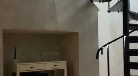 Modern staircase at New Vision Aesthetics, Bath, England, GB, enhancing the venue's sleek design.